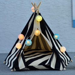 Cama-tepee interior con cojín grueso para descanso cómodo