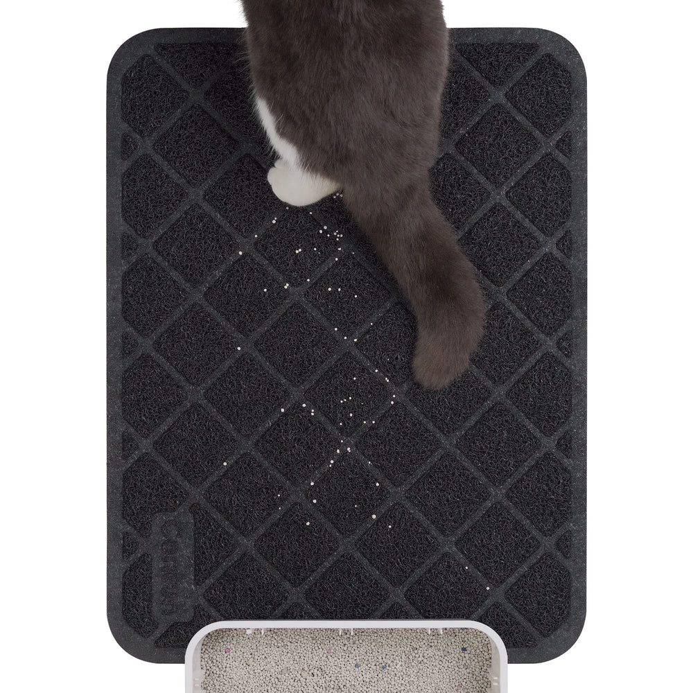Alfombrilla Conlun captura arena de gatos para evitar salpicaduras.