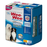 Tapete Wee-Wee de Four Paws con guardia de derrames en cuatro lados para seguridad del suelo.