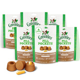 Greenies bolsitas de píldoras para perro con la bolsa abierta, facilita la toma.