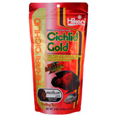 Hikari Cichlid Gold Medium presenta el alimento en gránulos para acuario.
