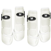 Botas Horntack para espinillas en caballo blanco grande, protección de tendones y ajuste frontal.