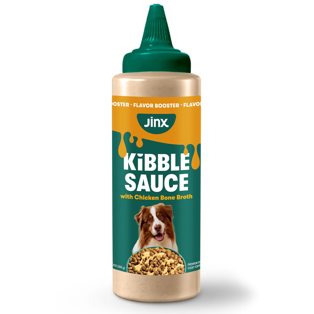 Botella de Jinx Kibble Sauce con caldo de pollo real para perros.