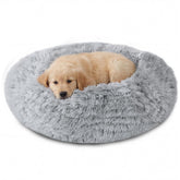 Cama para perro JOLLYVOGUE en forma de dona con borde elevado para soporte de cabeza