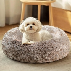 Cama JOLLYVOGUE para perros: forma de dona suave que favorece descanso y calma