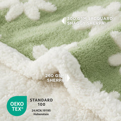 Manta LE SURE con tejido jacquard y textura nube 3D, estilo verde.