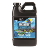 MICROBE-LIFT Xtreme condicionador-agua botella vertiendo: facilita la preparación de agua para acuario.