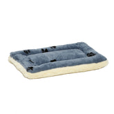 MidWest QuietTime XXS, cama para jaula, vista superior azul con huellas, ideal para transporte.