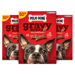 Milk-Bone GravyBones, tres cajas visibles, recompensa para perros.