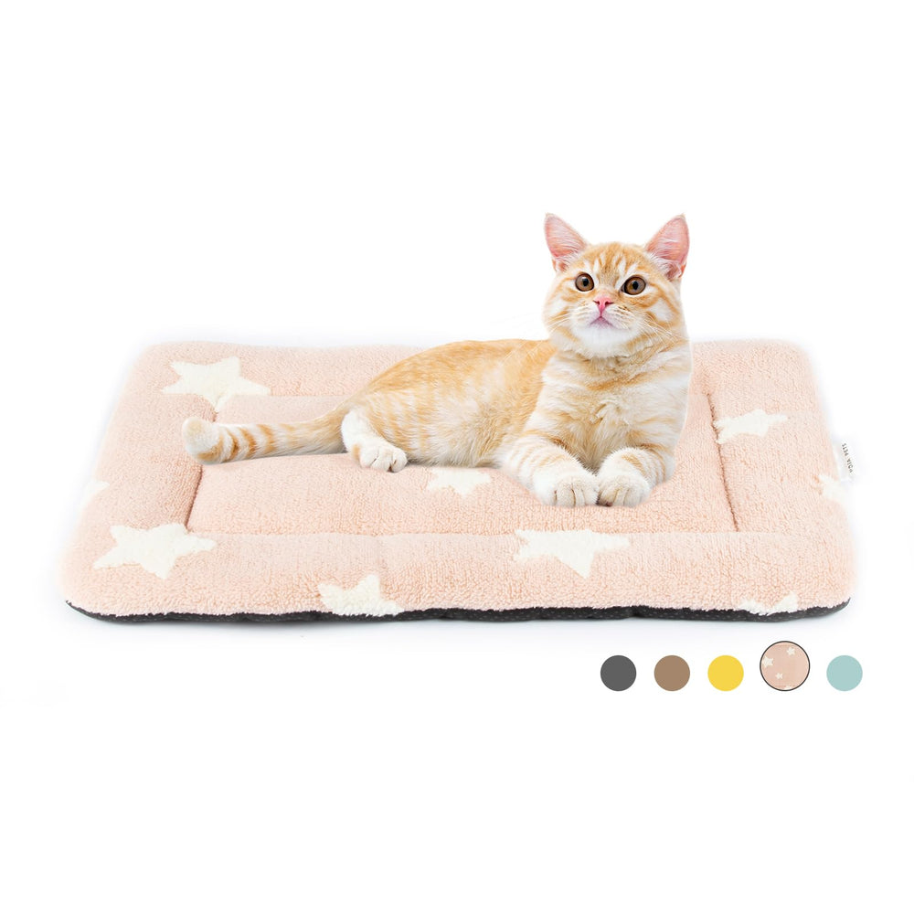 Cama Mora Pets para gatos en rosa, lavable a máquina para uso diario.