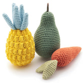Juguete Nina Woof de frutas en algodón orgánico para mordisqueo suave y seguro