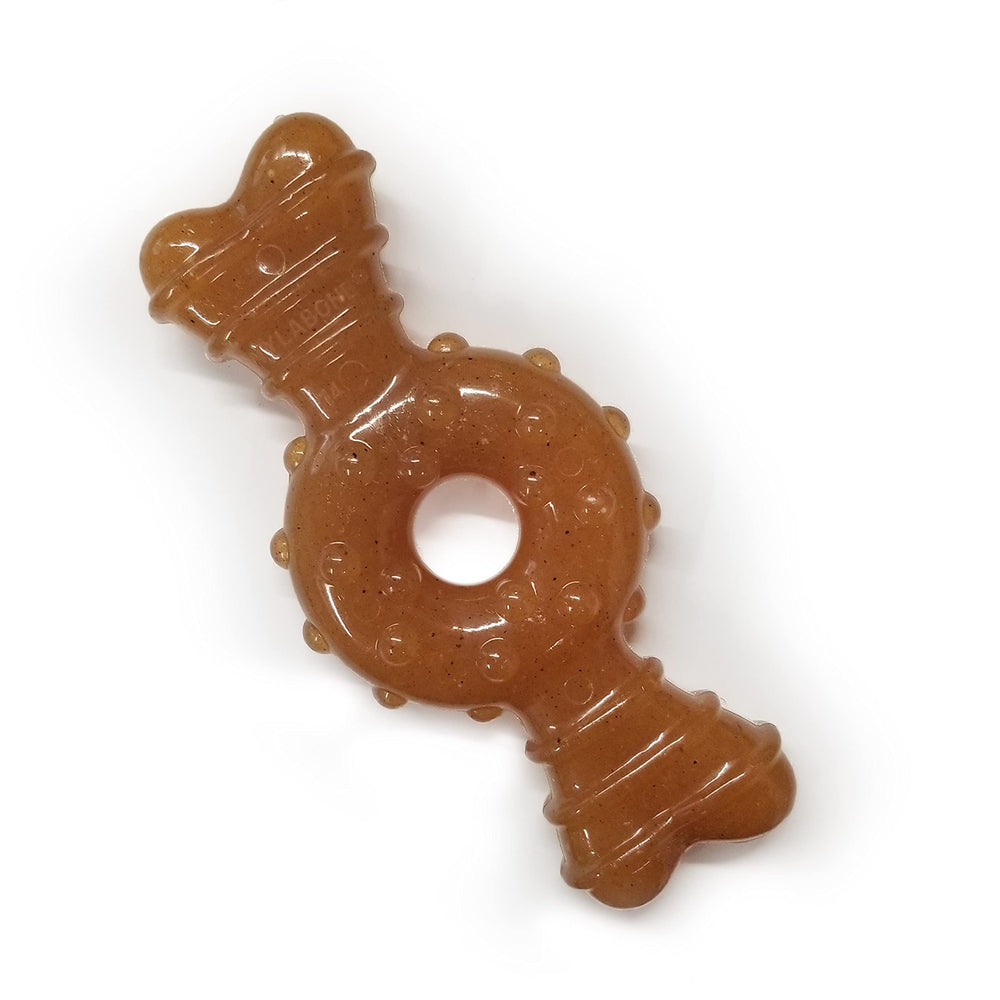 Nylabone Anillo-Hueso para Cachorro en acción: fomenta masticación suave y confort para dentición.