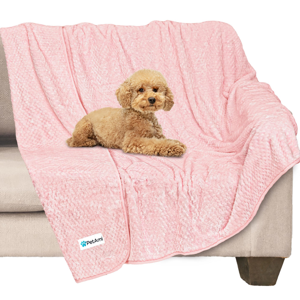 La manta PetAmi impermeable para perros rosada protege muebles y camas.