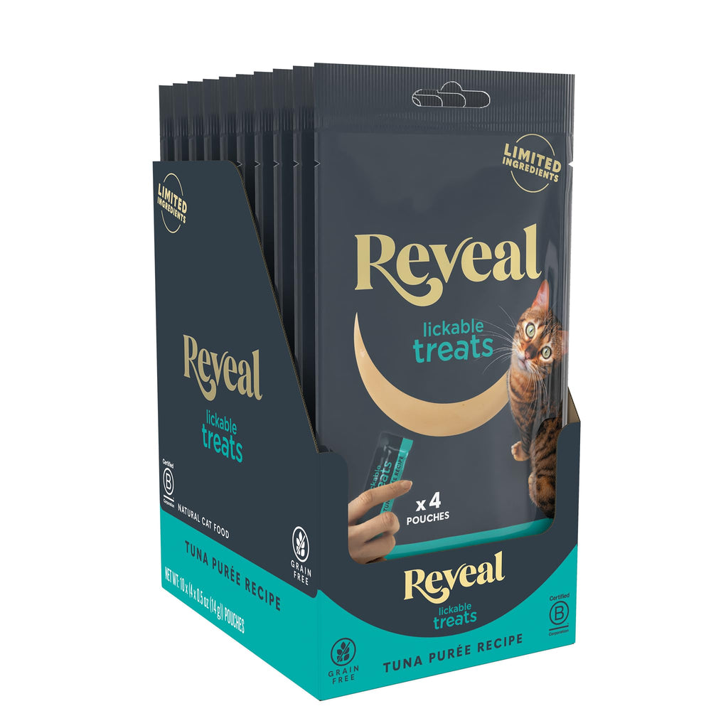 Puré para gatos Reveal en envase abierto, textura suave y sabor a atún.