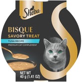 Gato saboreando Sheba Bisque Lickable en bol de atún, complemento sabroso