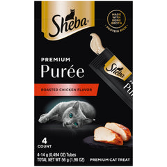 Gato disfruta de Sheba Premium Puree Pollo Asado en tubo para lamido sabroso.