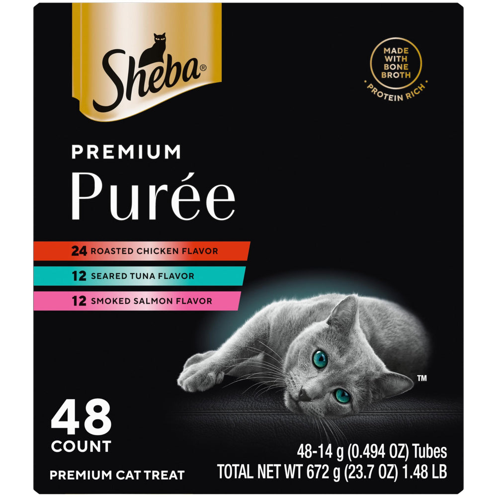 Sheba Puré Premium en tubo con pollo asado, merienda indulgente y práctica para gatos curiosos.