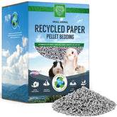 Small Pet Select cama con gránulos de papel reciclado para una superficie limpia y cómoda.