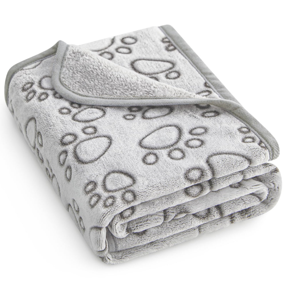 Manta Stuffed para perro pequeño junto a la cama, calidez y confort