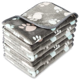 Couverture Tatuo pour chien avec empreintes-pattes, repos idéal.