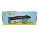 Tetra LED Hood 30x12, vista frontal, diseño compacto para acuarios modernos.