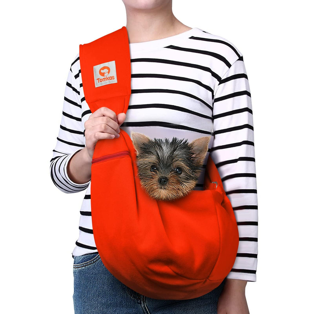 Tomkas Sling con bolsillo frontal y cremallera para llaves y móvil durante paseos.