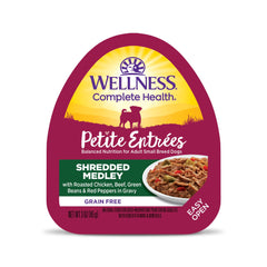 Wellness Petite Entrées Medley con pollo asado y res, trozos jugosos con verduras para perros pequeños.