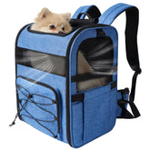 XUVIRA mochila portadora con malla transpirable para perros pequeños durante caminatas.