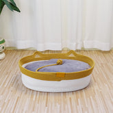Cama para gatos Yaruiguang tejida en cuerda, refugio ovalado y cómodo.