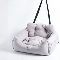 AidouPet asiento elevador para perros gris compacto, ideal para viajes seguros.