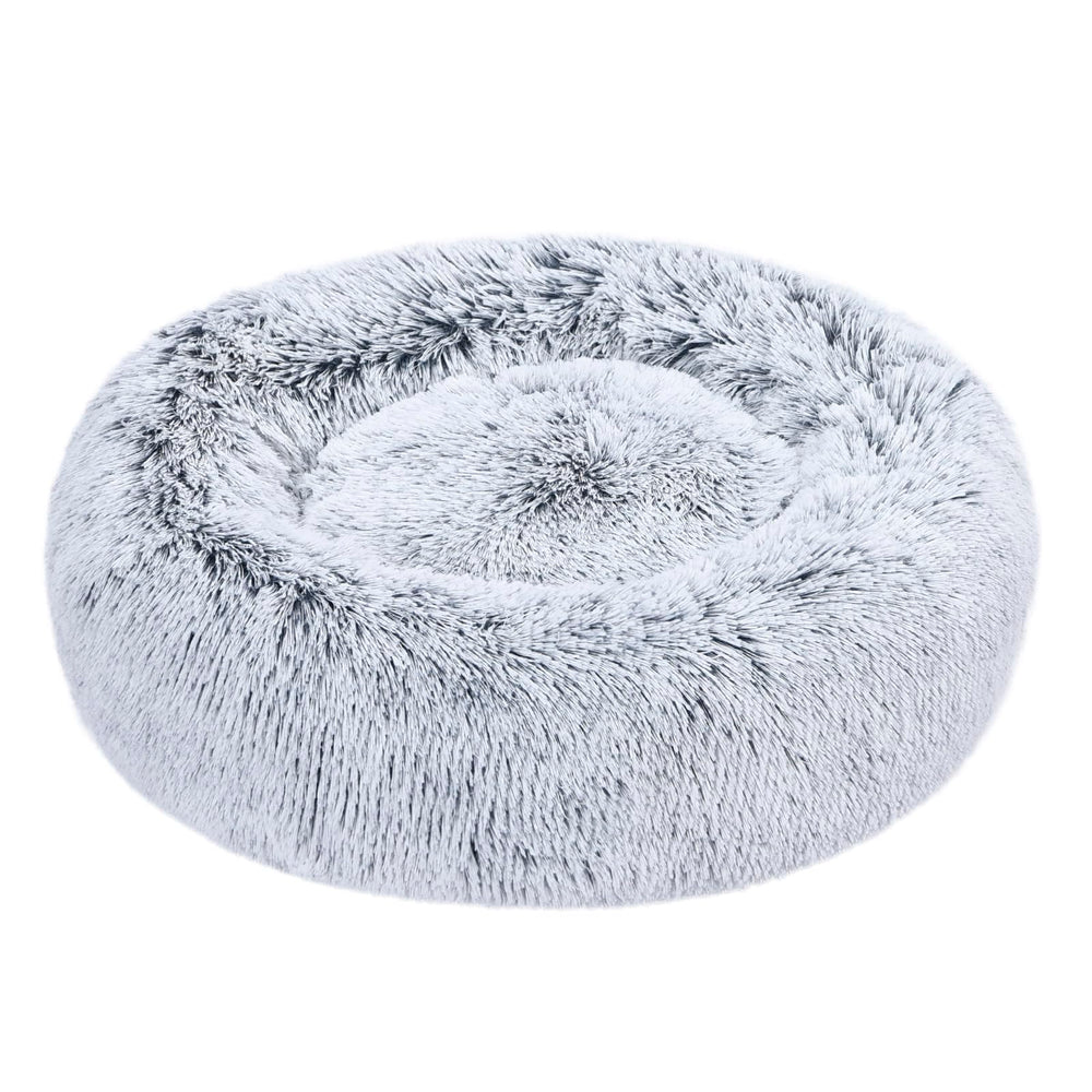 Amazon Basics cama-donut para mascota con pelaje suave, ideal para acurrucarse.