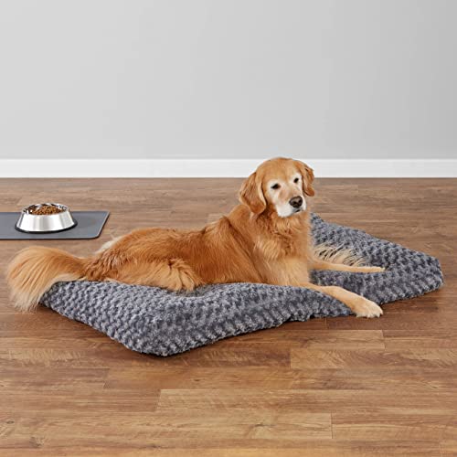 Amazon Basics cama para mascotas en interiores, adecuada para perros y gatos.
