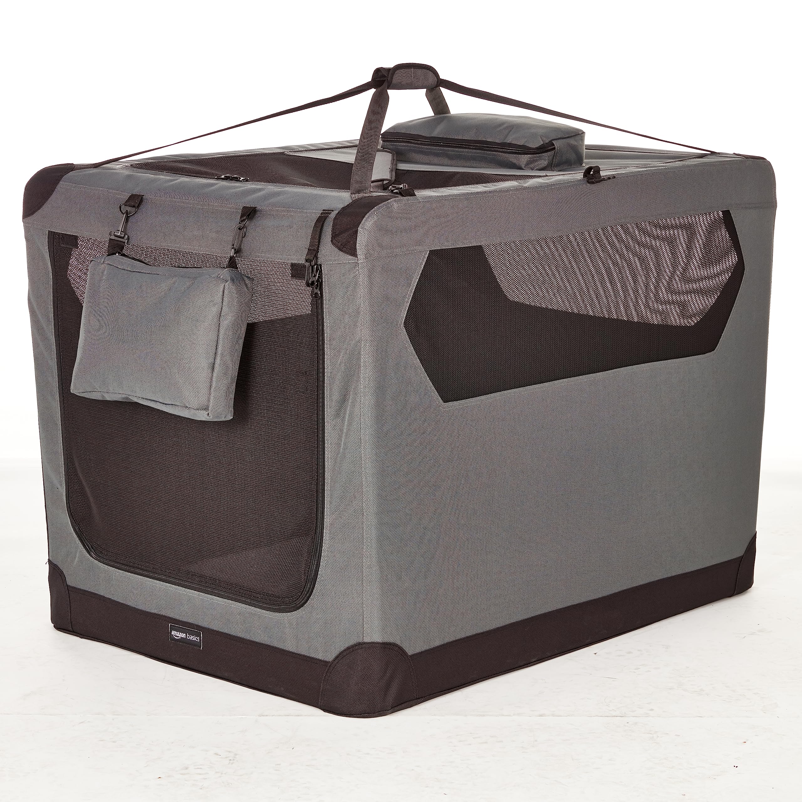 Transportín para perro de Amazon Basics con ventilación de malla, ideal para viajes cortos.