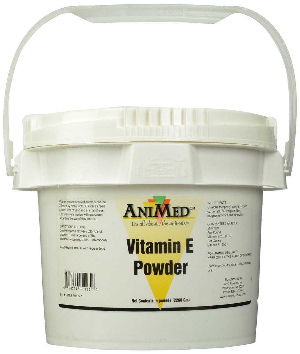 ANIMED vitamina E en polvo en bote, ideal para añadir a la comida de mascotas.