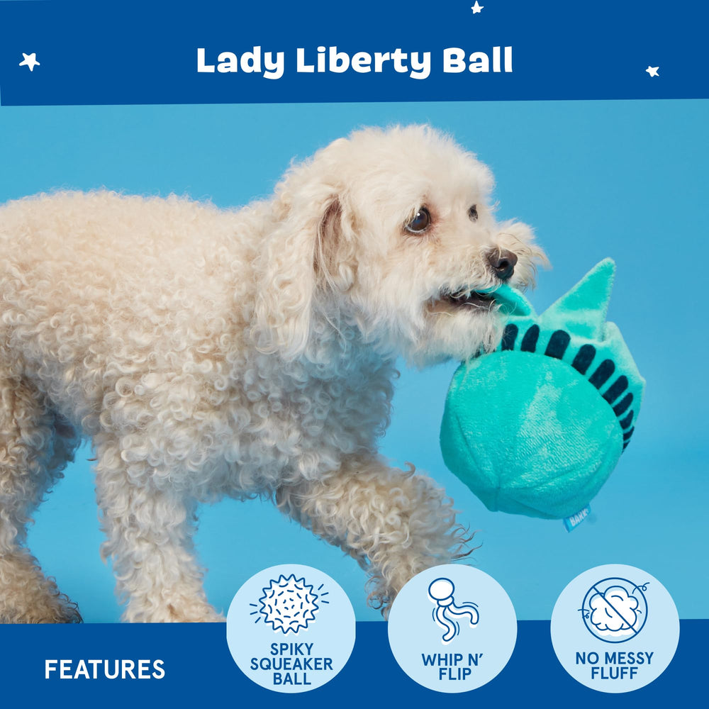 BarkBox Lady Liberty Ball núcleo espinoso oculta sorpresa sensorial durante el juego.