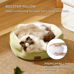 Interior acolchado Bedsure, refugio cómodo para cachorro y gatito en verde.