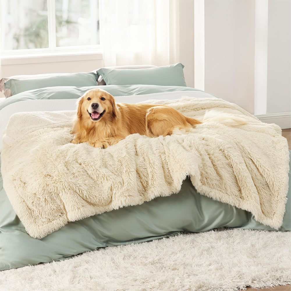 Bedsure manta impermeable para perros grandes crema protege muebles y derrames.