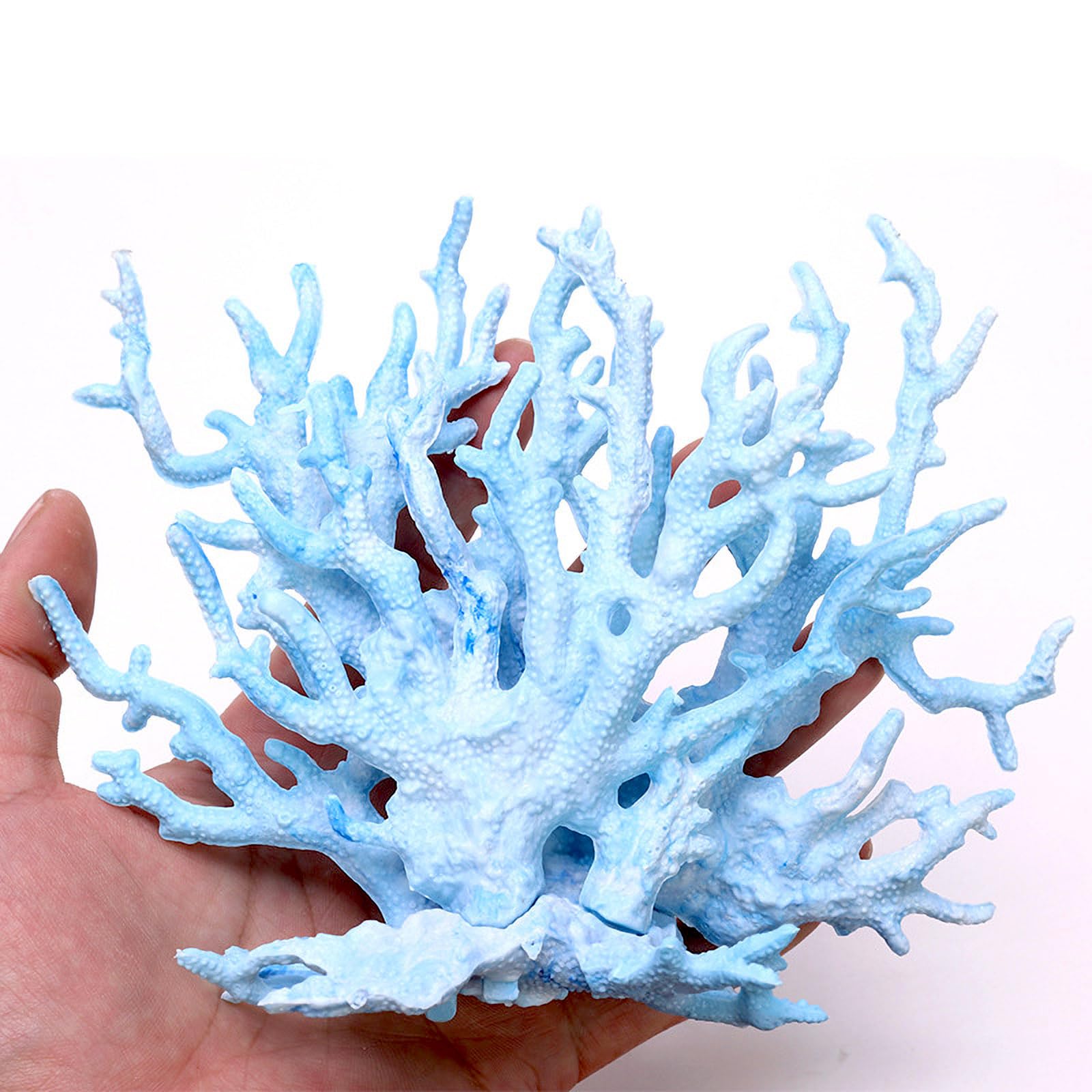 Besimple coral artificial con refugio para peces, ideal en acuarios comunitarios.
