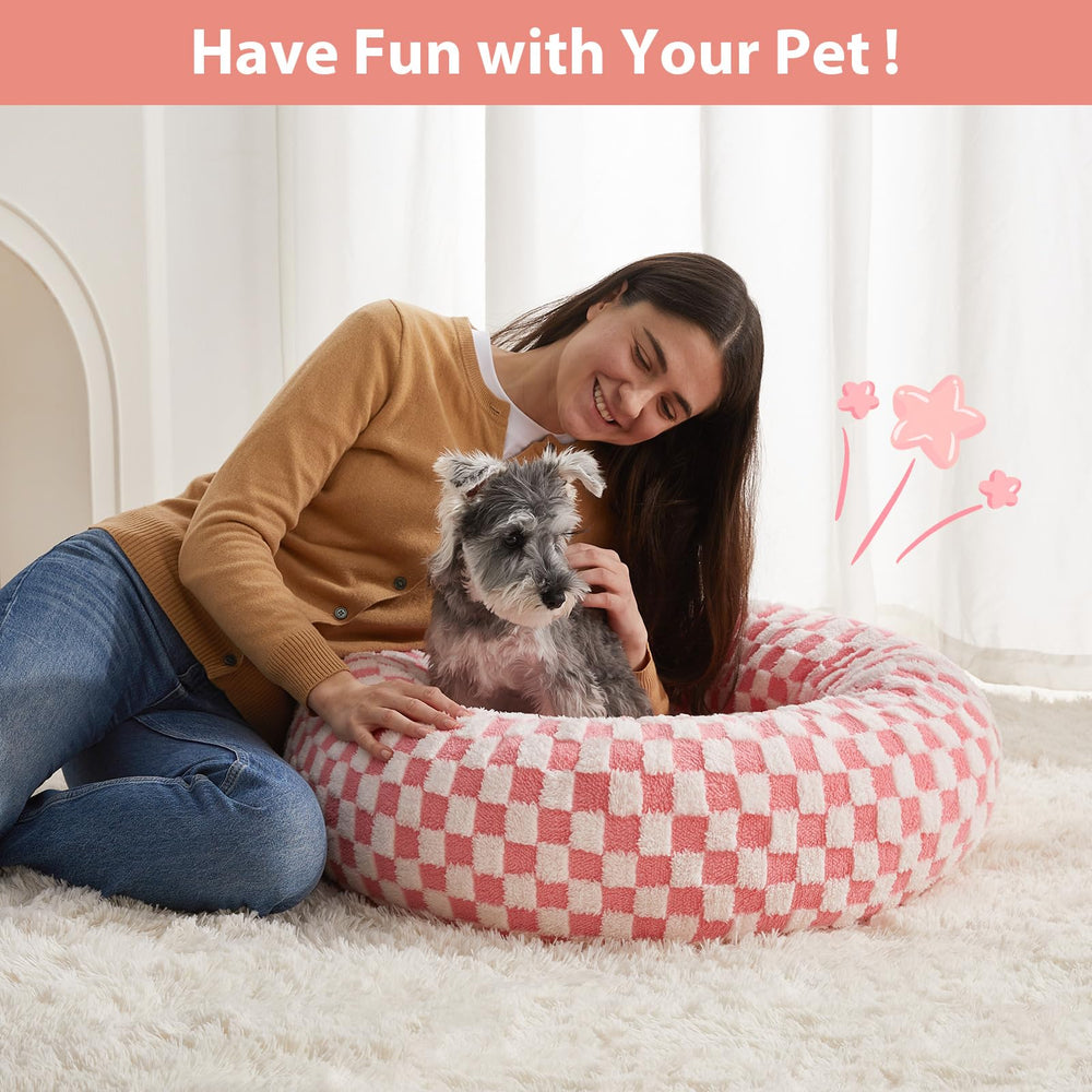 Cama donut BFPETHOME, rosa, diseño moderno y suave para un rincón de descanso elegante.