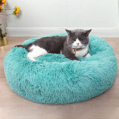 Cama-donut-peluche interior azul 20x20 suave y cálida para gatos.