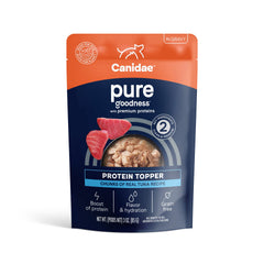 CANIDAE Pure Protein Topper con trozos de atún en salsa para aumentar proteína diaria.