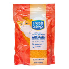 Cristales desodorizantes Fresh Step en la caja de arena para gatos, control de olores.