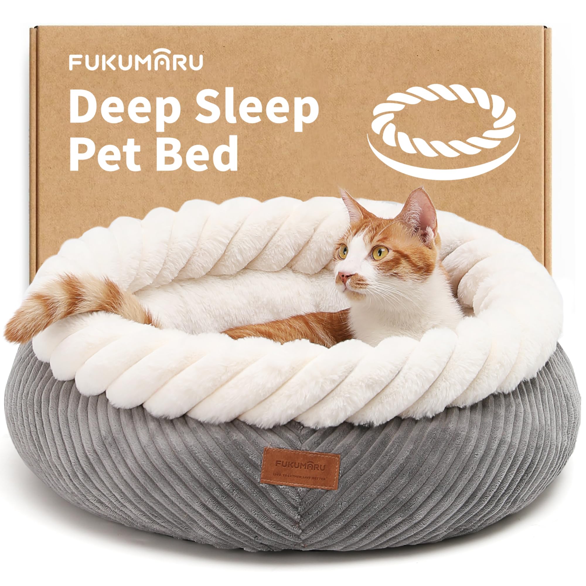 Cama FUKUMARU, vista redonda con peluche suave para descanso cómodo.