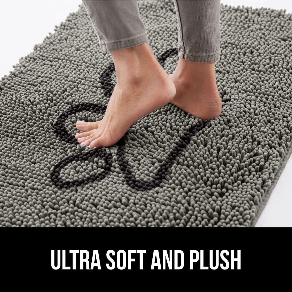 Tapis gris pour pattes de chien, anti-traces et pratique.