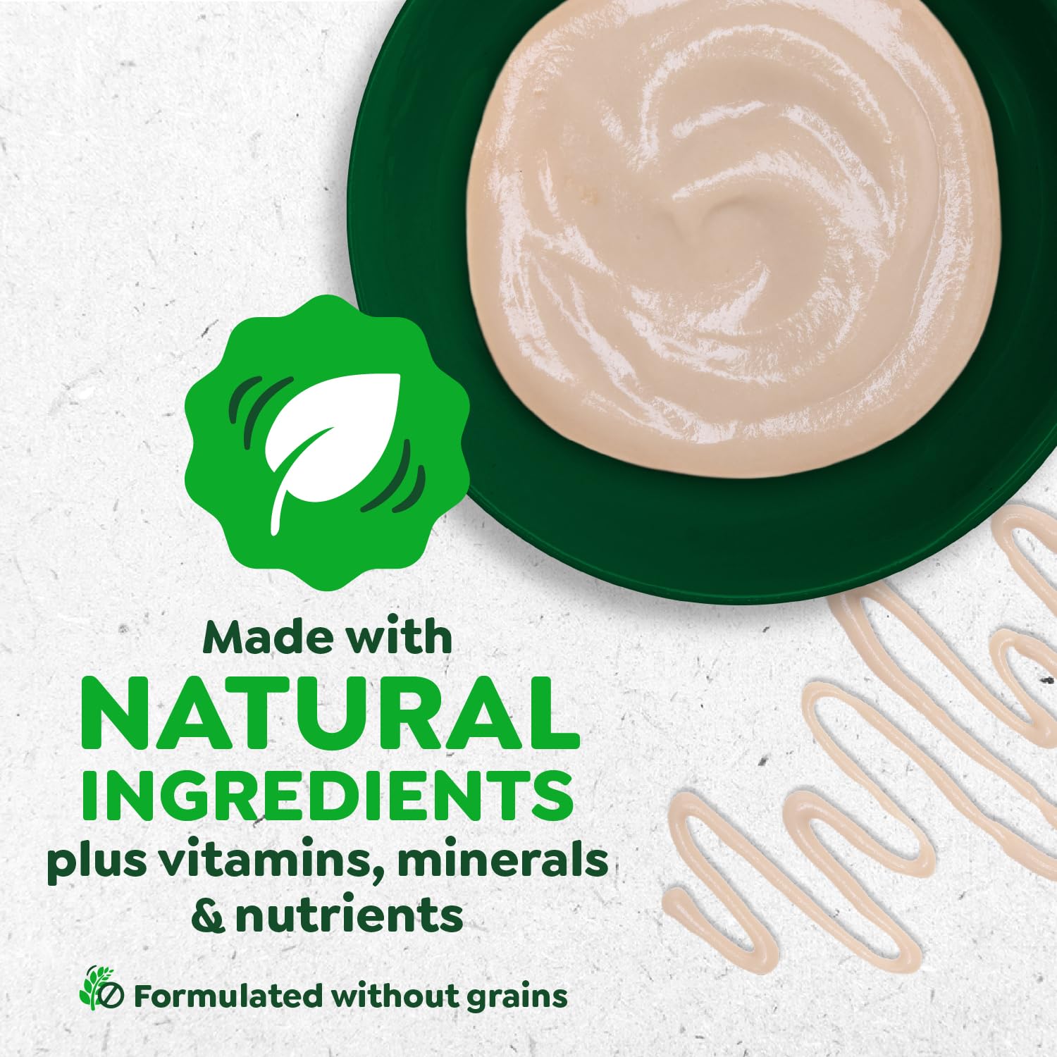 Greenies finger-feeding bonding moment with creamy texture that cats enjoy.