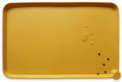 Tapete de alimentación de silicona antideslizante Hoki Found L protege superficies.