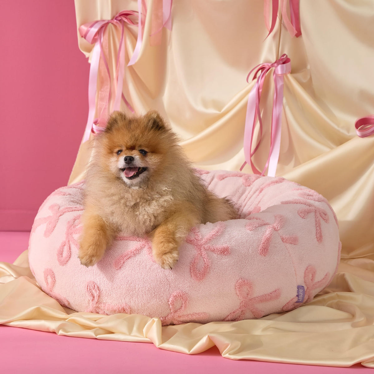 LE SURE Donut cama para perro pequeño, rosa taffy, borde acolchado para soporte.