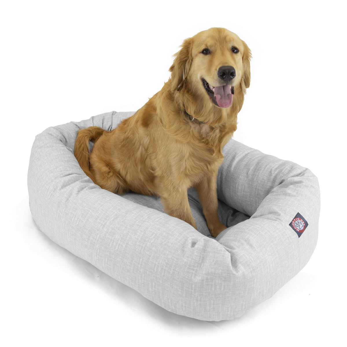 Cama bagel donut de Majestic Pet ofrece soporte para la cabeza y cuello durante siestas.