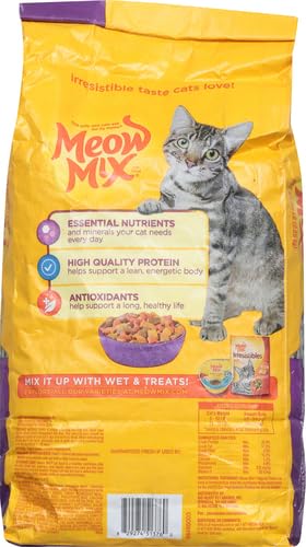Meow Mix Original Choice: gato comiendo en plato, sabor apetitoso.