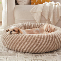 Cama MIXJOY para perros pequeños, forma de dona, descanso cómodo y seguro en casa.